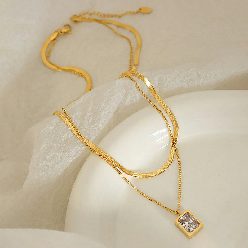 Elegant Layered Gold Necklace with Rectangular Crystal Pendant