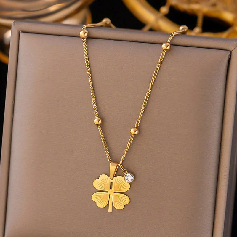 Elegant Gold Four-Leaf Clover Pendant Necklace with Crystal Charm